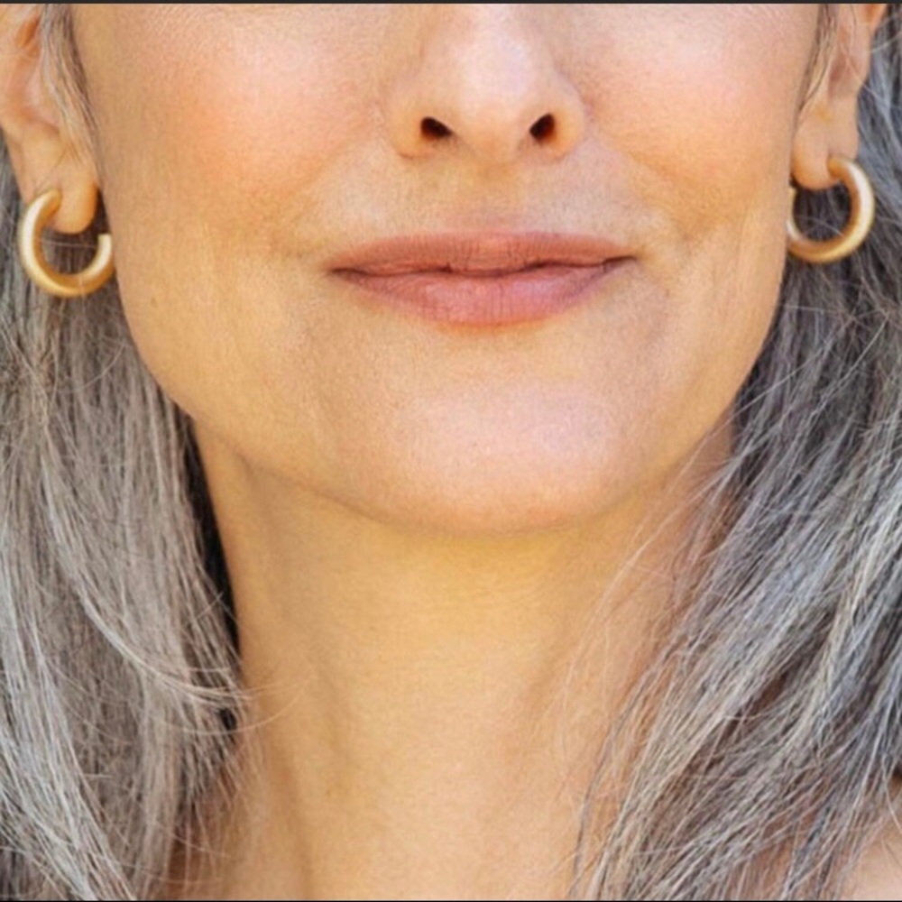The Sanctuary Project Gold Hoop earrings.